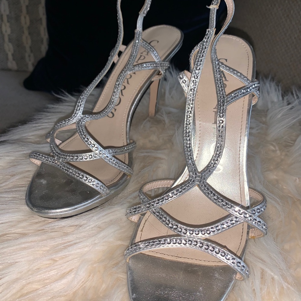 Silver Heels, Size 8.5. Only worn once or twice.